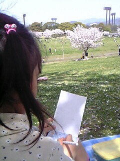 春日公園で日記を書く.jpg